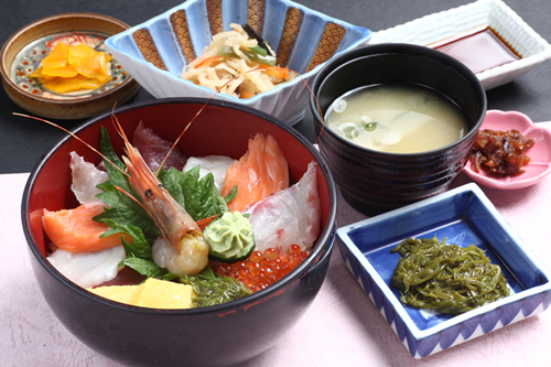 Seikan Kaisen Don(Bowl of rice topped with sliced raw fish)